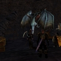 Once again Draigoch shows his limited intelligence falling for the old 'He's behind you' trick.